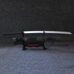 Professional studio photo of #1 Ocean Storm Wooden Sword with petrol and blue striped scabbard and 104cm silver blade for RGB gaming setup decor.