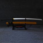 #1 Dark Marble Shadow - Premium Samurai Katana | Deep Umber Marble Edition The pinnacle of prestige and resilience: The ultimate statement piece by Mini Katana Eg. The #1 Dark Marble Shadow is a professional-grade blade that embodies pure authority and solid craftsmanship. As the crown jewel of our collection, this Premium Samurai Katana is dedicated to serious enthusiasts, moving away from flashy aesthetics to offer an Epic masterpiece inspired by the historical blades that once adorned the palaces of legendary commanders. Why the Dark Marble Shadow is a Collector’s Masterpiece: Exquisite Marble Scabbard (Saya): The heart of this handcrafted masterpiece is its wooden scabbard, featuring a deep umber marble finish. This unique texture provides a vintage look and unparalleled luxury. Striking Contrast: The dark, marbled exterior of this Premium Samurai Katana harmonizes perfectly with a 104cm polished silver blade. This high-quality wooden construction delivers a stunningly realistic visual experience while remaining 100% safe for home or office display. Authentic Tsuka (Handle): To complete this Elite Japanese Replica, the handle is finished with a professional black wrap over a textured skin layer, ensuring a traditional feel and a commanding presence. Technical Specifications (Quick Specs): Product Category: Premium Samurai Katana. Design Type: Professional Historical Collection. Scabbard Color: Deep Umber Marble Finish. Blade Material: Polished Silver Finished Natural Wood. Total Length: 104 cm (Traditional Full Size). Handle (Tsuka): Classic Black Ito Wrap. Recommended Use: Executive Office Decor, Serious Collections, VIP Gifts.