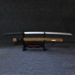 Professional photo of #1 Sovereign Marble Premium Samurai Katana with light brown marble scabbard and 104cm silver wooden blade displayed as luxury office decor.