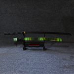 Professional studio photo of #1 Forest Phantom Wooden Sword with green and black striped scabbard and 104cm black blade for RGB gaming setup decor.