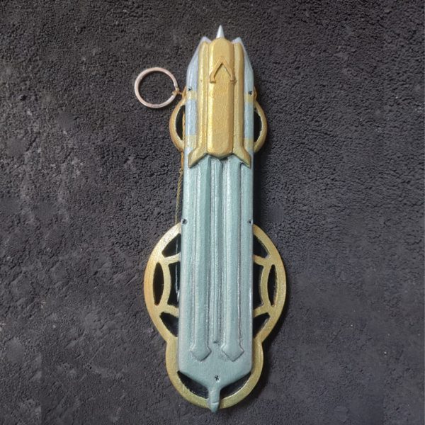 Handcrafted wooden Hidden Blade from Assassin’s Creed Mirage extended on a forearm.