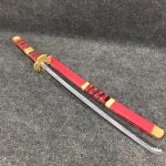 Budget friendly red and black low cost synthetic MDF wood Sandai Kitetsu katana with scabbard for anime fans
