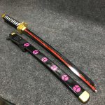 85cm Roronoa Zoro Shusui wooden wakizashi with black blade, pink wave pattern, and octagonal gold guard.