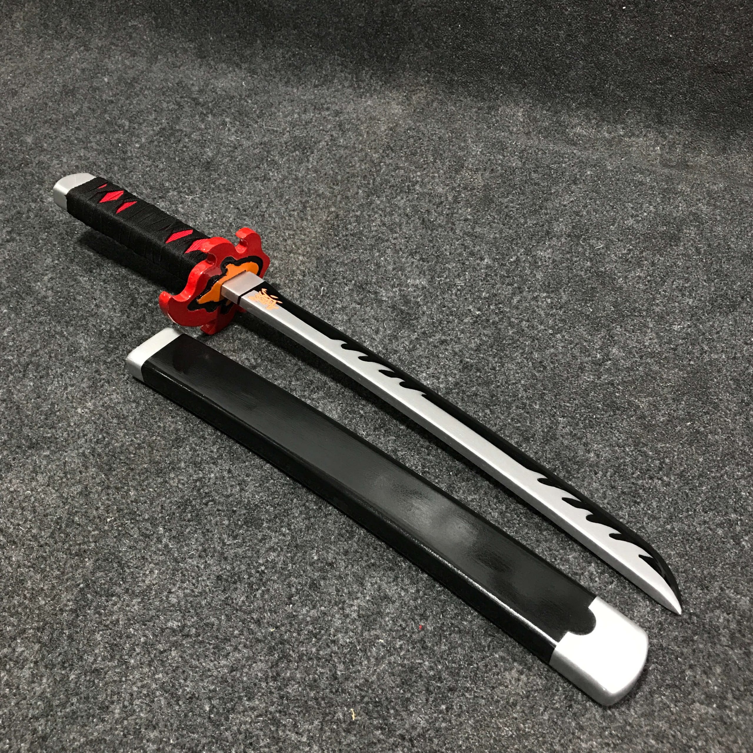 tan t2 55cm Tanjiro Kamado V2 wooden tanto with black blade and flame-shaped guard, Demon Slayer replica.