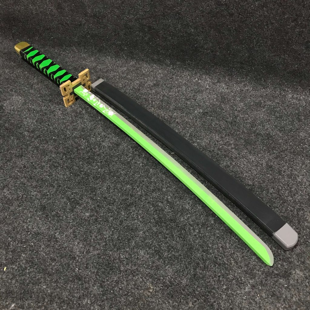 Close up detail of rectangular Muichiro Tokito synthetic MDF wood sword hilt cosplay