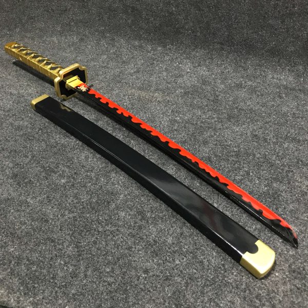 85cm Yoriichi Tsugikuni wooden wakizashi with black blade, circular gold sun guard, and black-and-gold wrapped hilt.