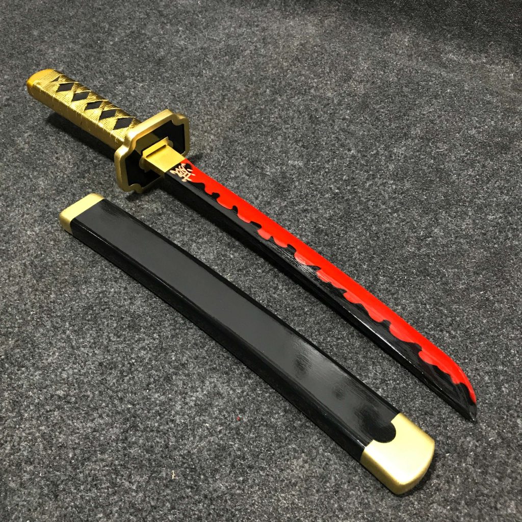 55cm Yoriichi Tsugikuni wooden tanto with black blade and circular gold sun guard, Demon Slayer replica.