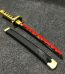 55cm Yoriichi Tsugikuni wooden tanto with black blade and circular gold sun guard, Demon Slayer replica.